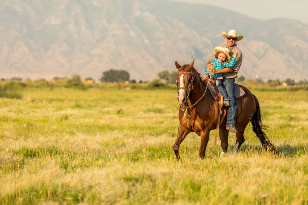 istock Father Daughter Horseback Riding 858766142