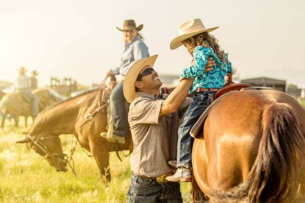 istock Father Daughter Horseback Riding 858766424