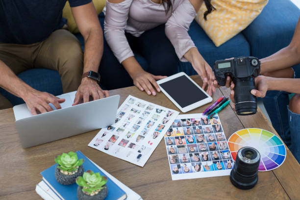 istock Graphic designers working together in the office 858766716