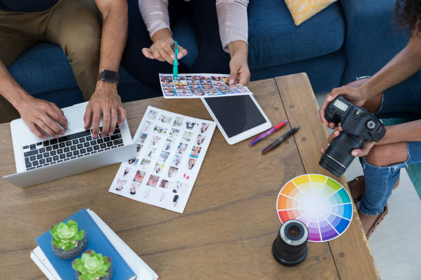 istock Graphic designers working together in the office 858766764