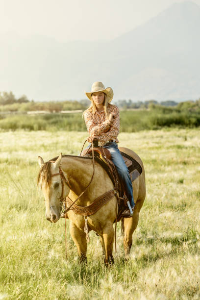 istock Strong Cowgirl Horseback Riding 858766904