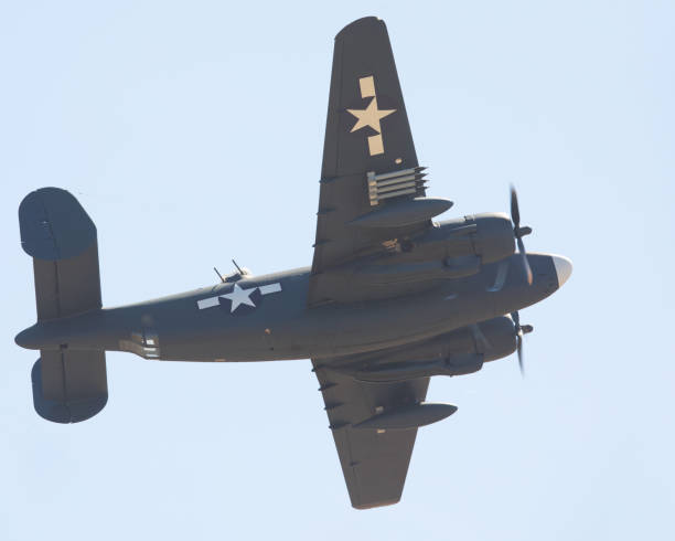 istock WWII bomber in a close view, with condensation trailing from the propeller tips at the wing edges and root 858776514