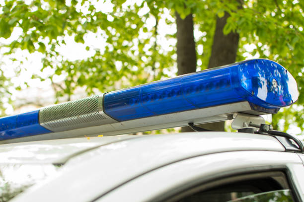istock Blue light bar on the police car 858781500