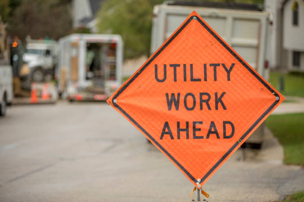 istock Road Safety Warning Sign, Utility Work Ahead 858790974