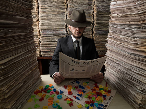 istock Censor Agent Reading Newspaper In Media Library For Censorship 858794008