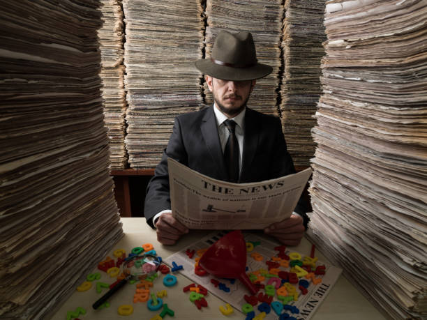 istock Censor Agent Reading Newspaper In Media Library For Censorship 858794128