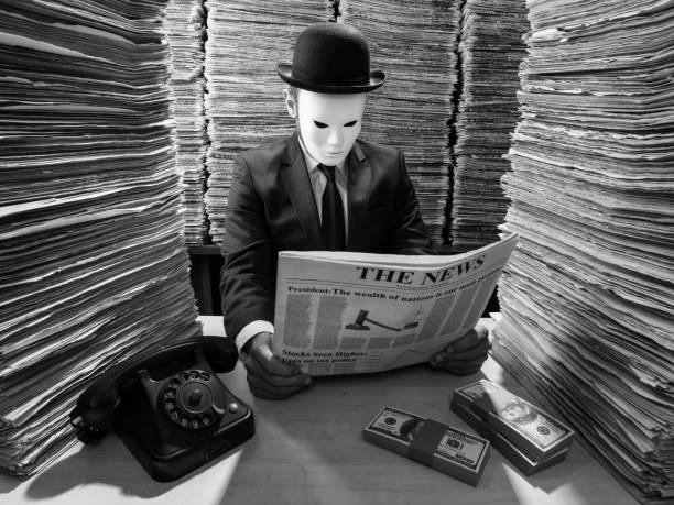 istock Censor Agent Reading Newspaper In Media Library For Censorship 858797254