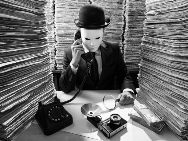 istock Censor Agent Reading Newspaper In Media Library For Censorship 858797346