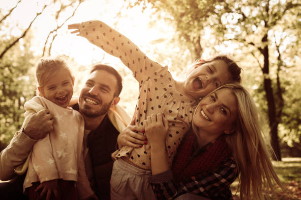 istock Cheerful family in park. 858801014