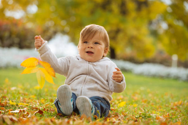 istock Child enjoying autumn time 858801918