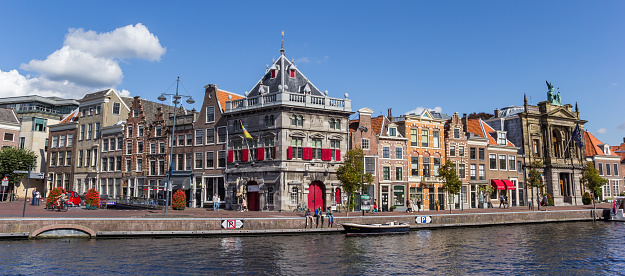 Haarlem, Netherlands - September 03, 2017: Panorama of the colorful Spaarne canal in Haarlem, Netherlands