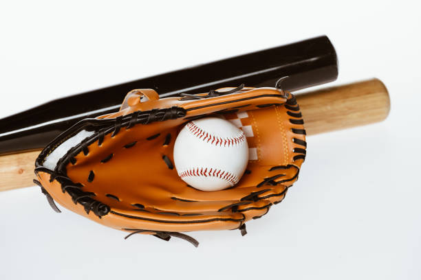 istock bats, ball and mitt isolated on white 858848432