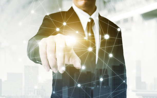istock Network and Connection technology concept, Double exposure of businessman hand touching world map point with building in the city 858859090