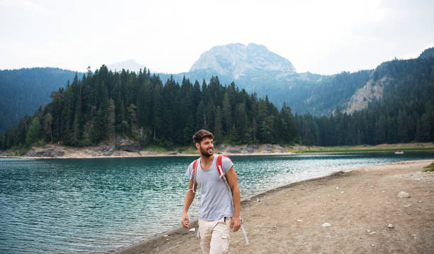 istock Young handsome man traveling. 858864776