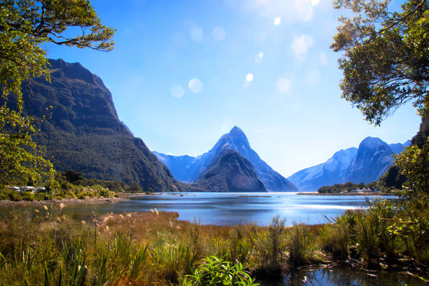 Mitre peak, Milford Sound, Fiordland, New Zealand. Shot from the opposite side of Mitre peak. fiordland national park photos stock pictures, royalty-free photos & images