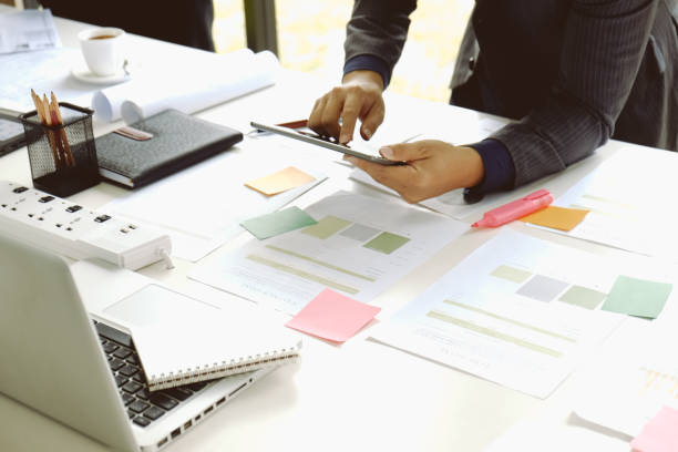 istock Young investor work with new startup project in office. 858881044