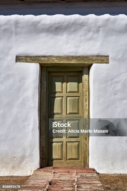 Exterior Doorway Of Adobe Structure Stock Photo - Download Image Now - Adobe - Material, Antique, Bank Manager