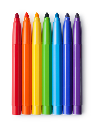 Rainbow colored markers on white background.