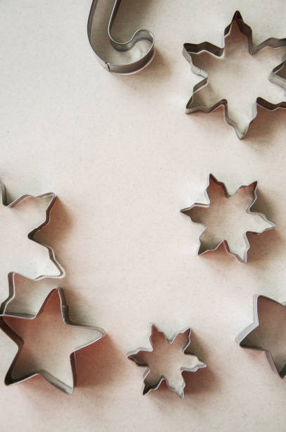 istock Cookie cutters on a wooden background. Flat lay. 858902402