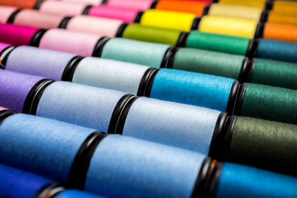 close up of sewing threads Colorful Background close up of sewing spool of threads embroidery photos stock pictures, royalty-free photos & images