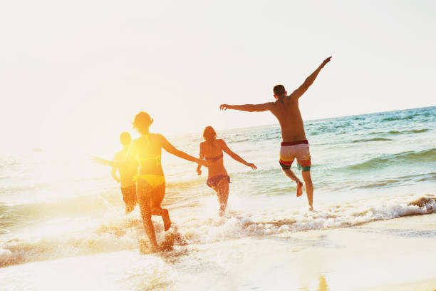 istock Happy friends sea beach holidays 858902898