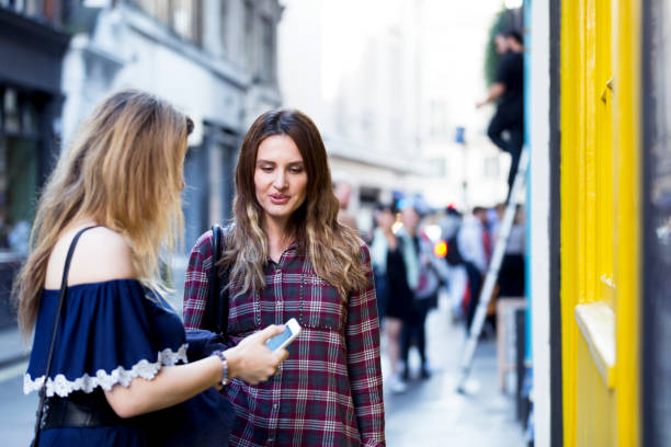 istock Getting a message on the smart phone from a friend 858907416