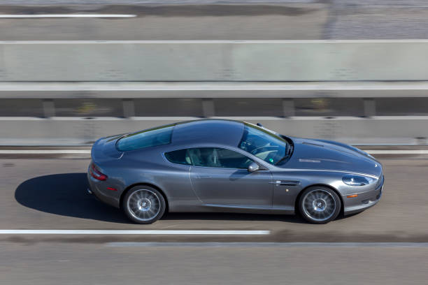 Frankfurt, Germany - Sep 19, 2017: Aston Martin Vanquish supercar driving on the highway in Germany