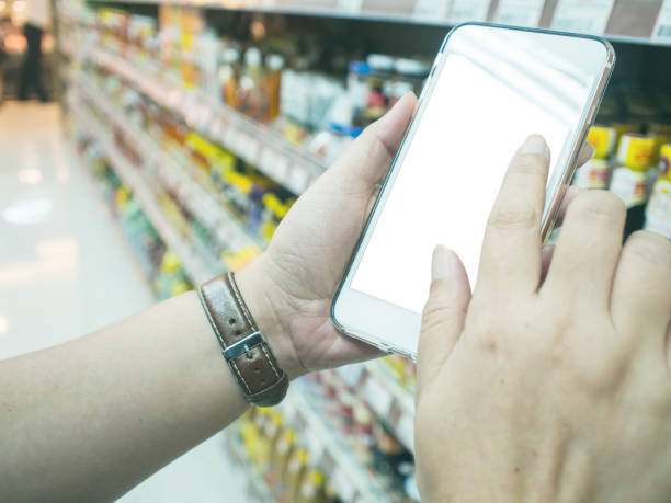 istock Woman's hands holding smart phone for online shopping 858910948