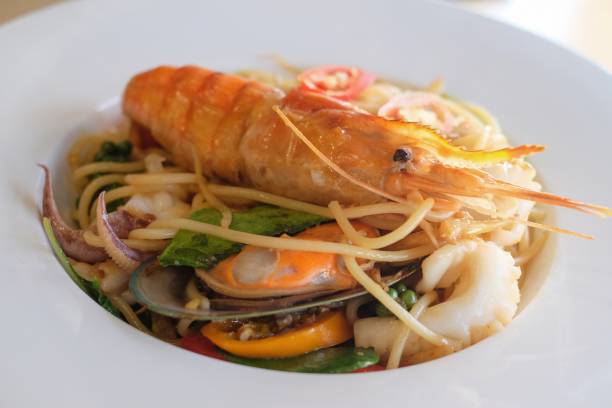 istock Spicy Spaghetti seafood in white plate 858917678