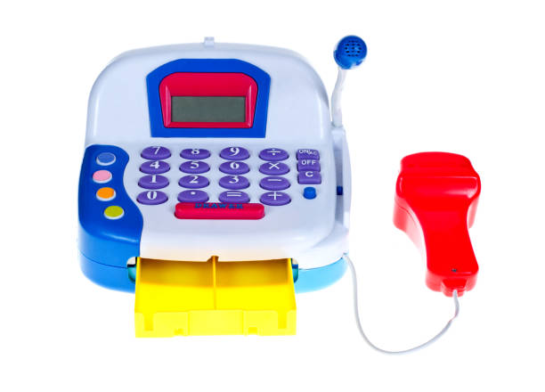 A plastic toy cash register isolated on white