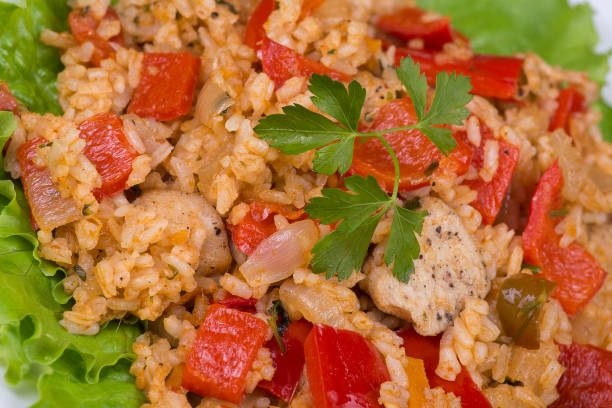 istock Rice with vegetables and chicken in a curry sauce 858924660