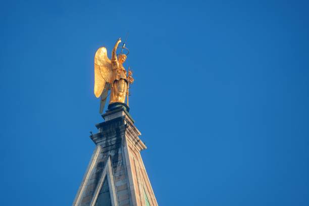 istock Golden statue of angel 858927900