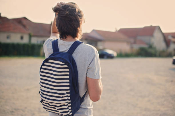 istock Man walking outdoors 858928688
