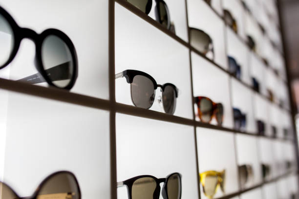 Display full of sunglasses sunglasses on a display case at the optics shop arabian sunglasses stock pictures, royalty-free photos & images