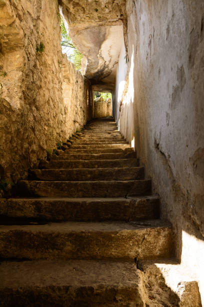 istock Ancient stairs carved into the rock 858946318