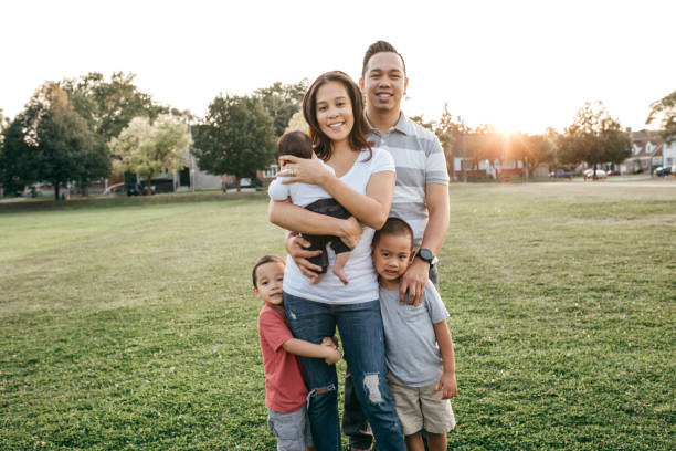 istock Family with three kids having fun 858952550