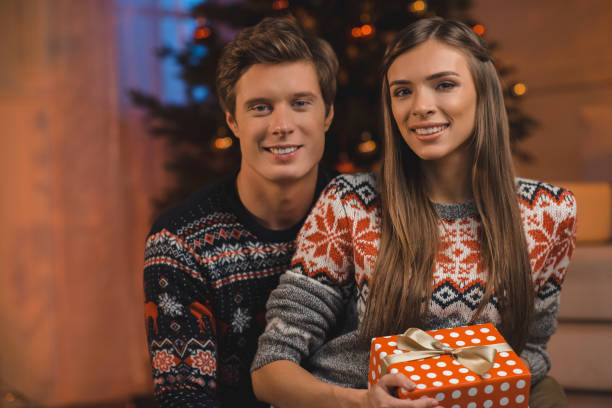 istock couple on christmas eve 858954892