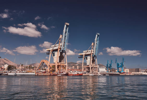 istock Harbor of Palermo, harbor crane, Sicily 858955154