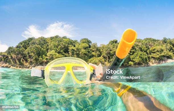 Adventurous Guy Taking Photo Of Snorkeling Mask Underwater Adventure Travel Lifestyle Enjoying Happy Fun Moment At Similan Islands Beach Trip Around World Nature Wonders Warm Turquoise Filter Stock Photo - Download Image Now