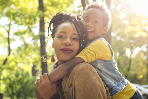 istock African American family in park. 858963590