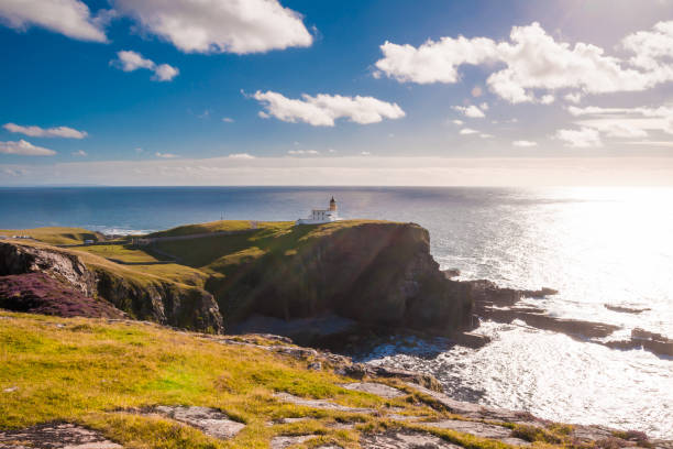 istock Lighthouse on a coast of Scottish highlands 858965966