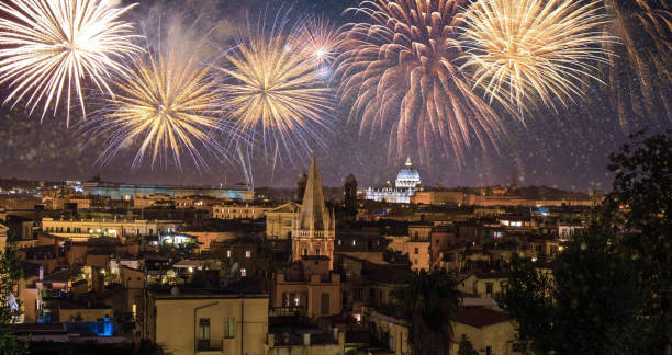 istock Night panorama with fireworks on the black sky. Rome, Italy 858967322
