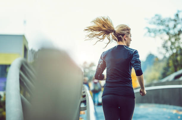 istock Female Athlete Exercising Outdoors 858970154