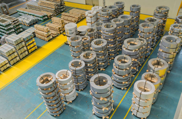 Rolled steel, warehouse storage Rolled steel in warehouse coating outer layer photos stock pictures, royalty-free photos & images