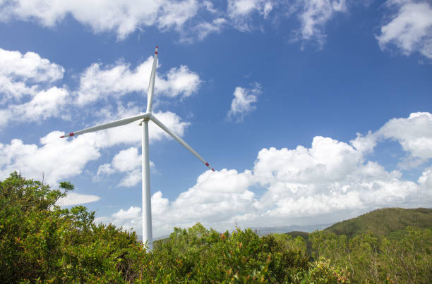 renewable energy by wind turbine system  at lamma island, hong kong - lamma island imagens e fotografias de stock