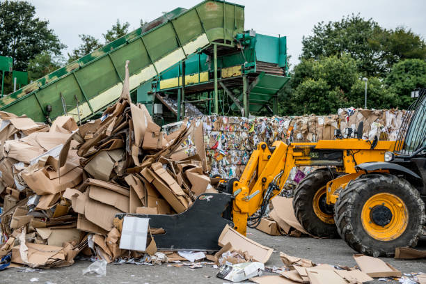 istock Separation of Cardboard at Garbage Recycling Center 858978776