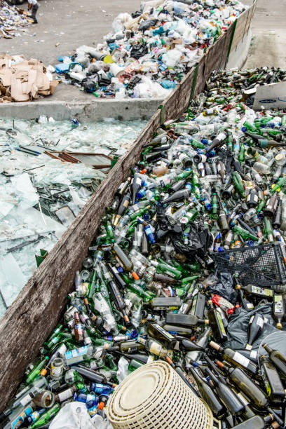 istock Colored Glass for Recycling at Waste Collection Center 858978822