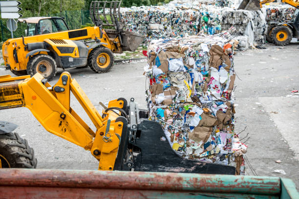 istock Separation of Cardboard at Garbage Recycling Center 858978836