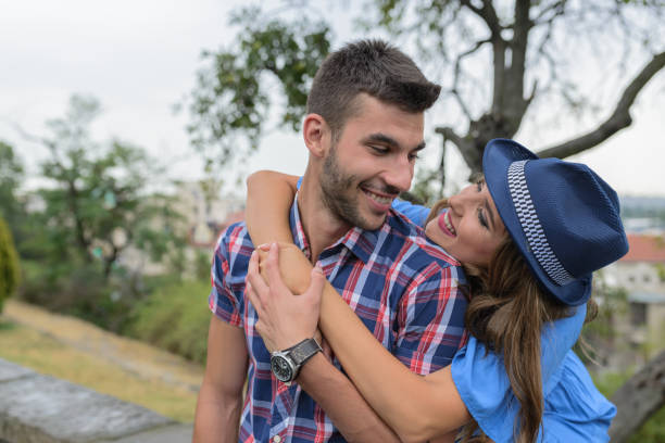 istock Young lovers enjoying their time in the public park 858978982