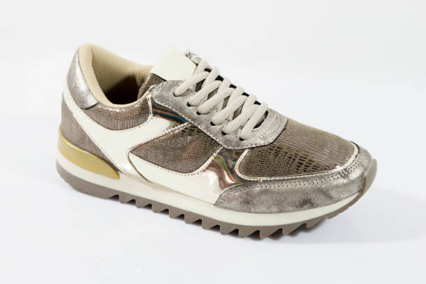 istock Female Brown Sneaker on White Background 858985868